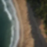 Aerial view of coastal erosion highlighting the impact of rising sea levels