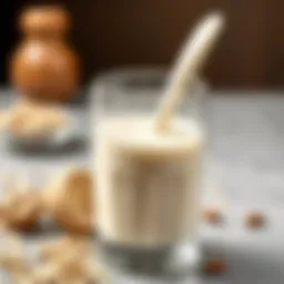 Oat milk in a glass with oats and nuts